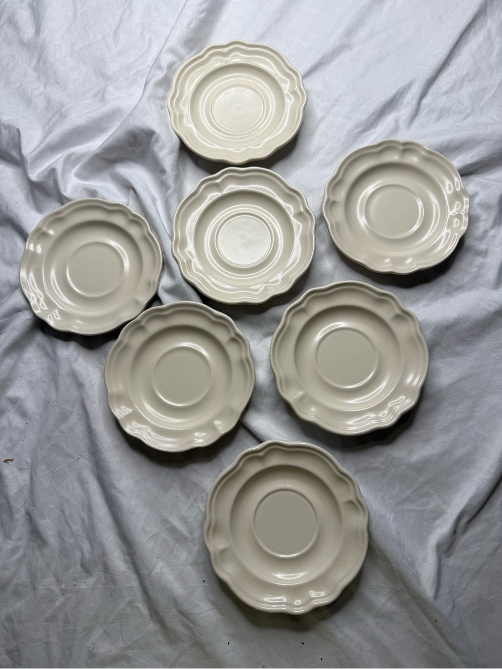 Pfaltzgraff Set of 7 Off-White Scalloped Saucers